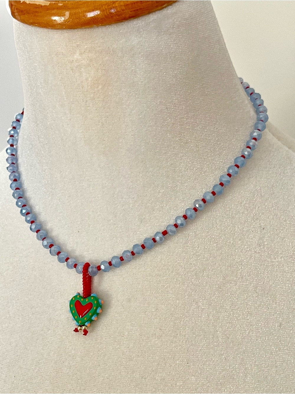 Sparkling Baby Blue Bead Necklace with Green Heart Pendant